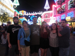 Under the Spectacle of Lights, Disney World Hollywood Studios, Nov 2014. L to R: my son Nick, Jean, me, daughters Alissa and Stefani, and her boyfriend Devin.