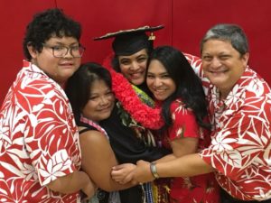 Emma and family at graduation