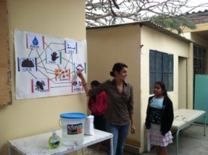 Teaching a "hand-washing" lesson at the health post in Peru