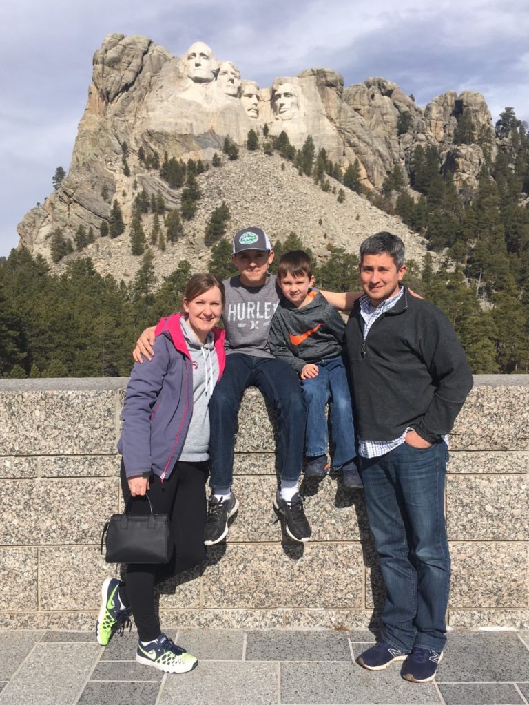 family photo of Timm, his wife and their two boys